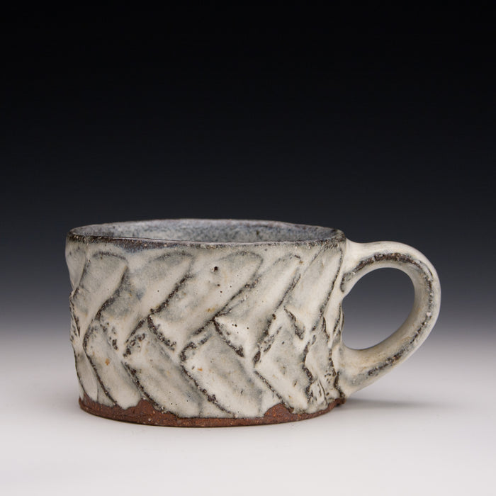 Carved nuka mug