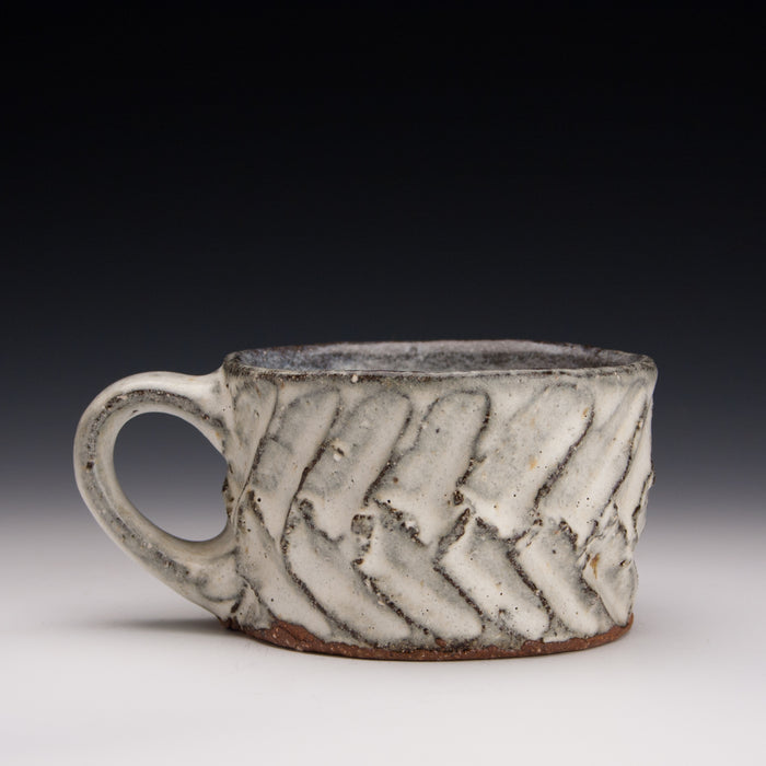 Carved nuka mug