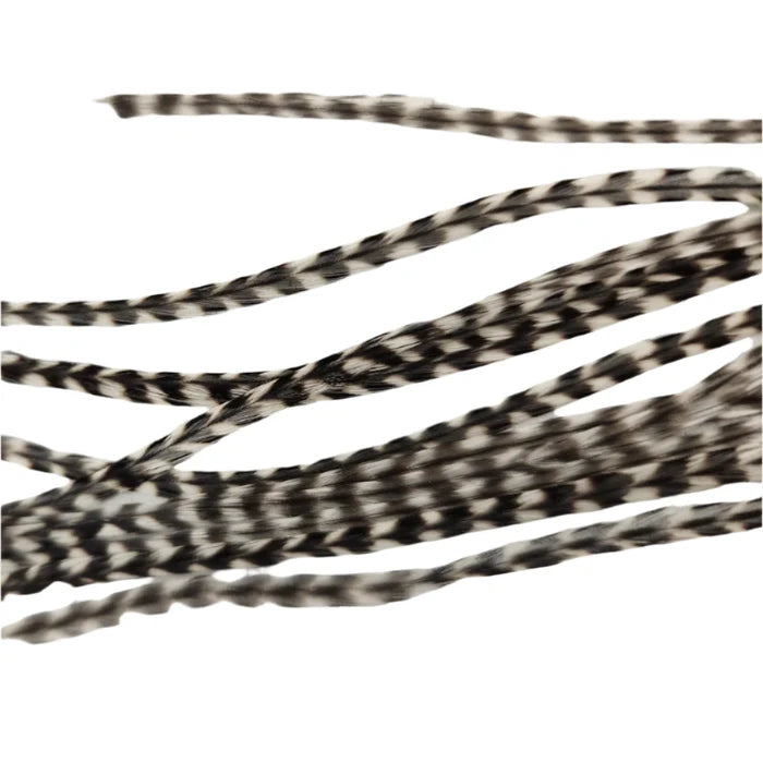 Keough Saddle Value Pack in grizzly – barred feathers with natural mottling, ideal for dry flies and adding realistic contrast to fly patterns.