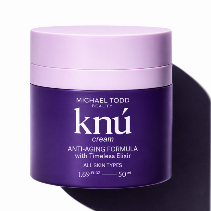 A jar of Michael Todd Beauty's Knú Cream anti-aging face cream on a white background. visible_badge