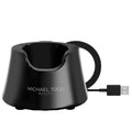 Michael Todd Beauty black charging dock with a USB cable for Soniclear device.