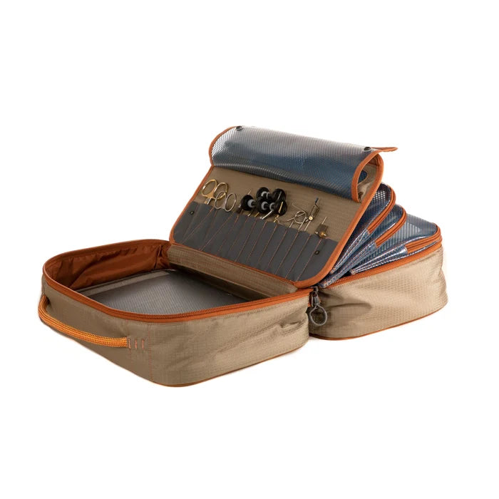 Tailwater Fly Tying Kit by Fishpond featuring organized compartments, durable fabric, and tool storage for fly tying at home or on the go.