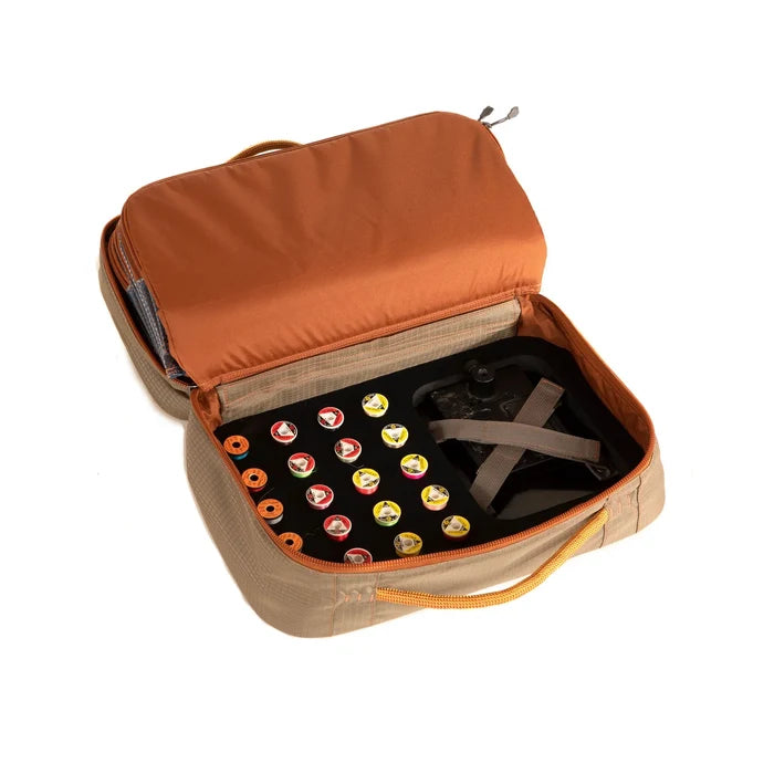 Tailwater Fly Tying Kit by Fishpond featuring organized compartments, durable fabric, and tool storage for fly tying at home or on the go.