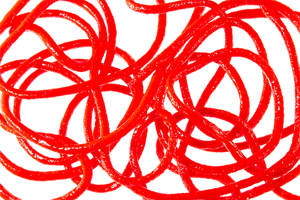 Pack of Trina’s Squirm Worm Material in soft, flexible strands for tying San Juan Worms and squirmy patterns.
