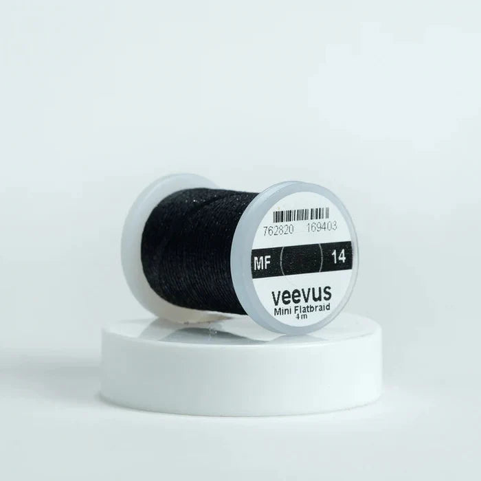 Veevus Mini Flat Braid in Black – adds a flat, highly reflective shimmer to fly patterns. Perfect for bodies, tags, and ribbing with a modern flash in black.